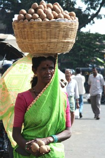 Woman Carrying Basket on Head
