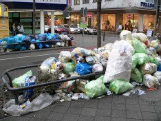 Overflowing Trash Lining the Streets